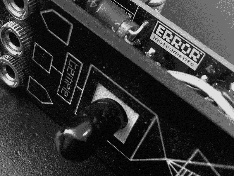 error instruments logo on the back of PCB of temple delay module